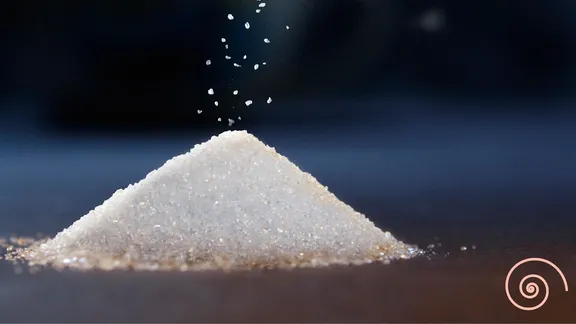 A close-up of a pile of white crystalline substance.